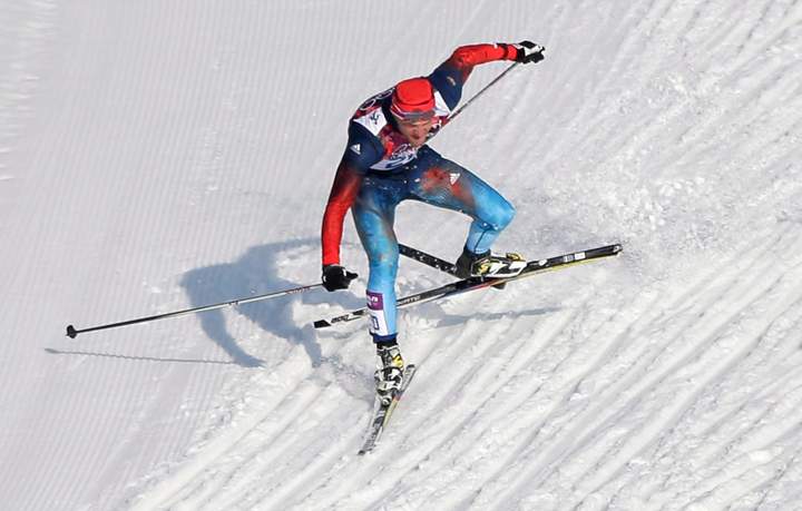 Russia’s Anton Gafarov falls with a broken ski during his men’s semifinal of the cross-country sprint at the 2014 Winter Olympics, Tuesday, Feb. 11, 2014, in Krasnaya Polyana, Russia.