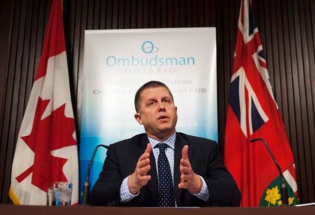 Ontario Ombudsman Andre Marin speaks at a news conference at Queens Park in Toronto on Tuesday February 4, 2014.
