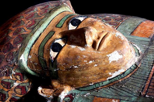 This photo released on Thursday, Feb. 13, 2014 by Egypt's Supreme Council of Antiquities, shows a preserved wooden sarcophagus that dates back to 1600 BC, when the Pharaonic 17th Dynasty reigned, in Egypt.