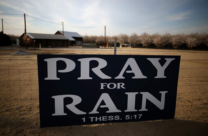 A sign is posted near an almond farm on Feb. 25, 2014 in Turlock, California. (Photo credit: Justin Sullivan/Getty Images)