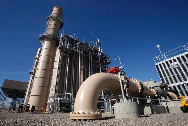 Water pipes lead to the cooling system of a Natural gas energy generator in Maxwell, Calif. Nov. 15, 2011.
