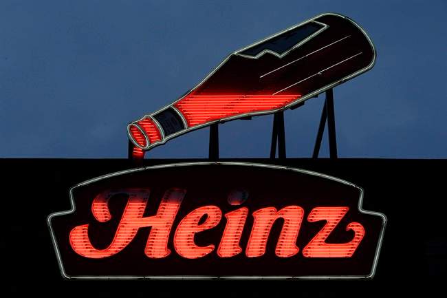 In this Feb. 14, 2013 photo, an animated neon Heinz Ketchup bottle sits in Pittsburgh.