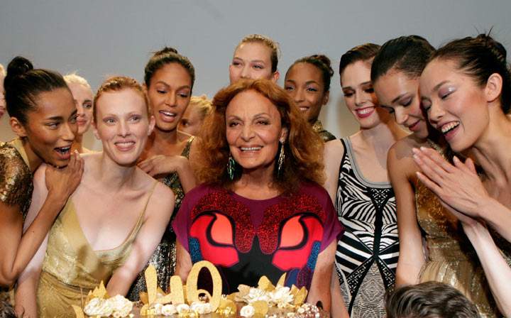 Fashion designer Diane von Furstenberg (C) and models celebrate the 40th anniversary of DVF’s wrap dress at the American Express UNSTAGED Fashion with DVF at Spring Studios on February 9, 2014 in New York City.