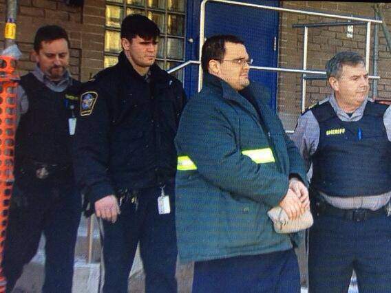 Chris Falconer is led from Pictou Court following being convicted of first-degree murder.