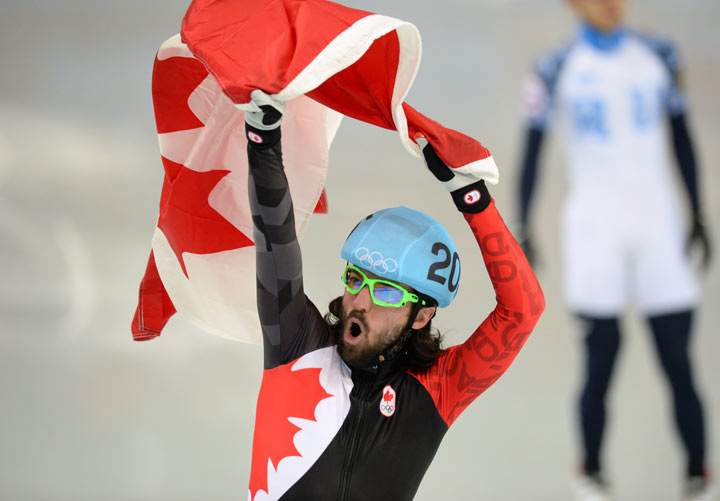 Charles Hamelin celebrates