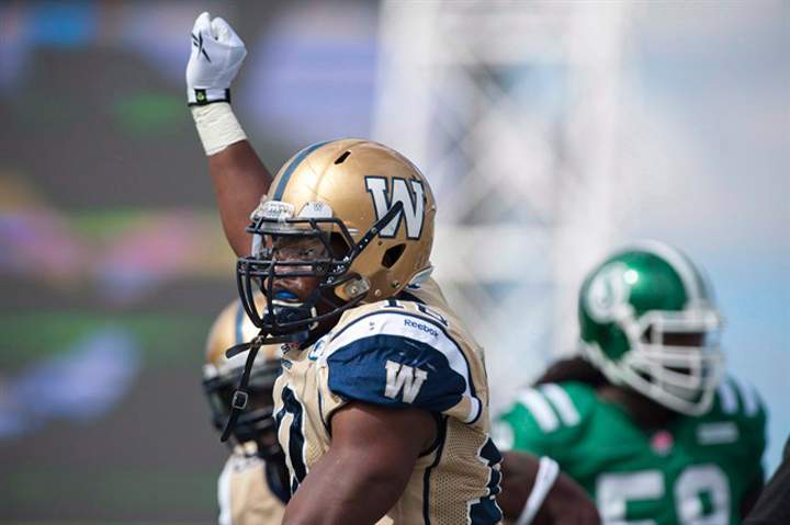 Winnipeg Blue Bombers linebacker Henoc Muamba celebrates a tackle against the Saskatchewan Roughriders in Regina on Sept. 1.
