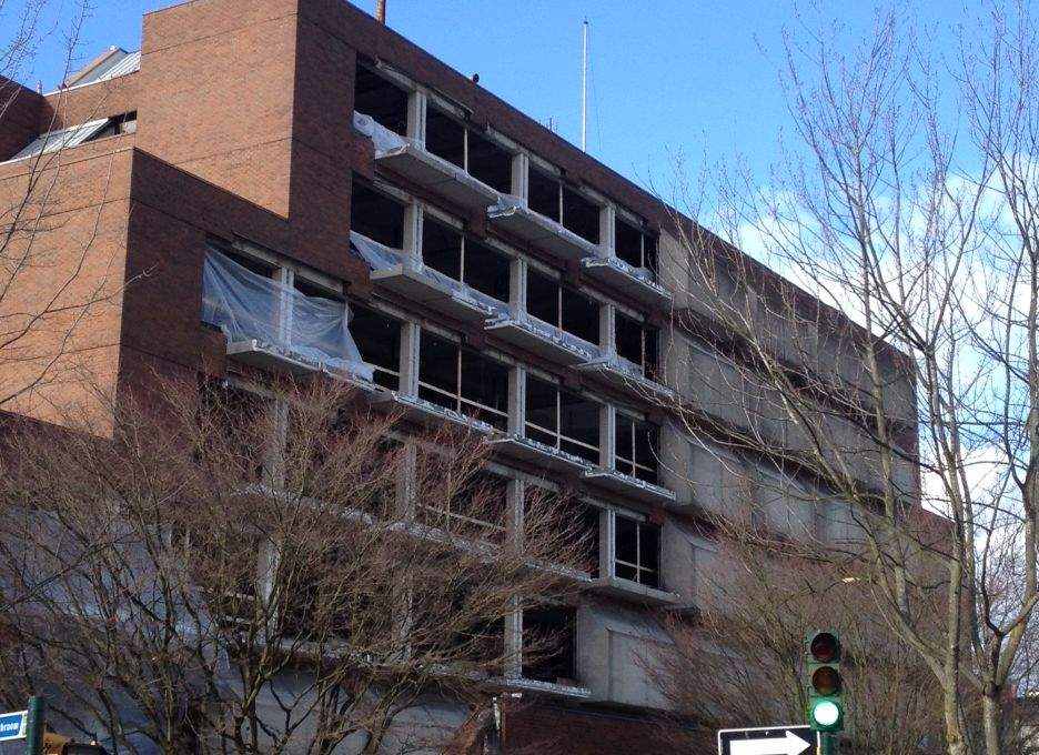 Concrete pods are being removed from the building and replaced with windows. The Downtown Community Court will remain on the site. Credit: Casey Clerkson, CPA Development Consultants.