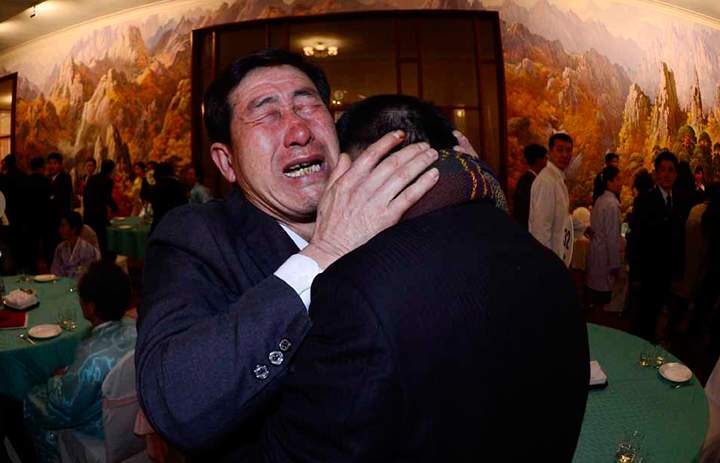 South Korean Park Yang-Gon (left) meets with his North Korean brother Park Yang-Soo during a family reunion after being separated for 60 years on Feb. 20, 2014 in Mount Kumgang, North Korea. (Photo credit: Park Hae-Mook-Korea Pool/Getty Images)