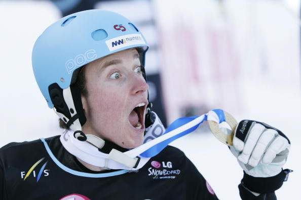 Canada's Michael Lambert poses with his gold medal after winning the Men's parallel slalom final at the FIS Snowboard World Cup on January 17, 2010 in Nendaz. 