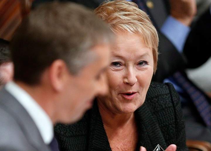 Quebec Finance Minister Nicolas Marceau is applauded by Premier Pauline Marois as he tables his budget Tuesday, November 20, 2012 at the legislature in Quebec City.