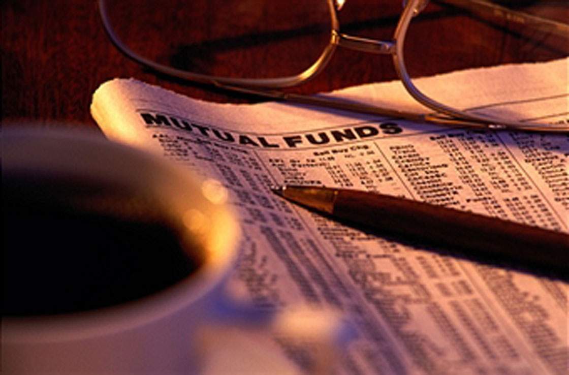 Canadian holdings of mutual funds have topped $1 trillion for the first time, according to an industry body. The investments have come under some criticism for high management fees in recent years.