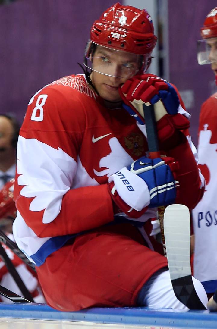 Alexander Ovechkin #8 of Russia watches from the bench during the Men’s Ice Hockey Quarterfinal Playoff against Finland on Day 12 of the 2014 Sochi Winter Olympics at Bolshoy Ice Dome on Feb. 19, 2014 in Sochi, Russia. (Photo credit: Bruce Bennett/Getty Images)