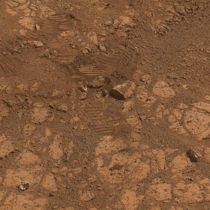 This image from the panoramic camera (Pancam) on NASA’s Mars Exploration Rover Opportunity shows where a rock called “Pinnacle Island” had been before it appeared in front of the rover in early January 2014.