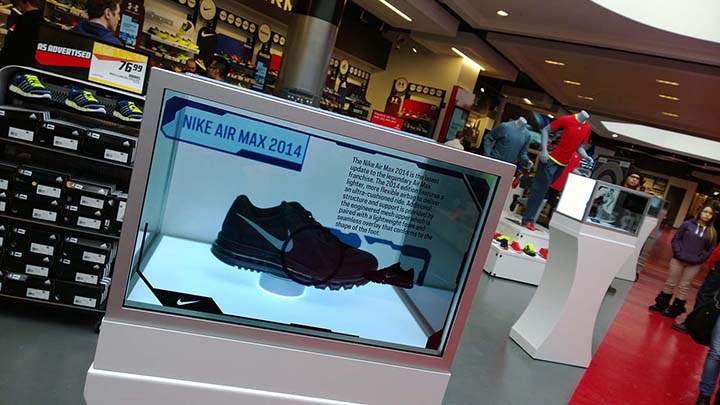 Brand names seen through transparent screened glass box displays