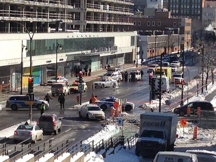 A man is fighting for his life after being shot by police in downtown Montreal on Monday, February 3, 2014.