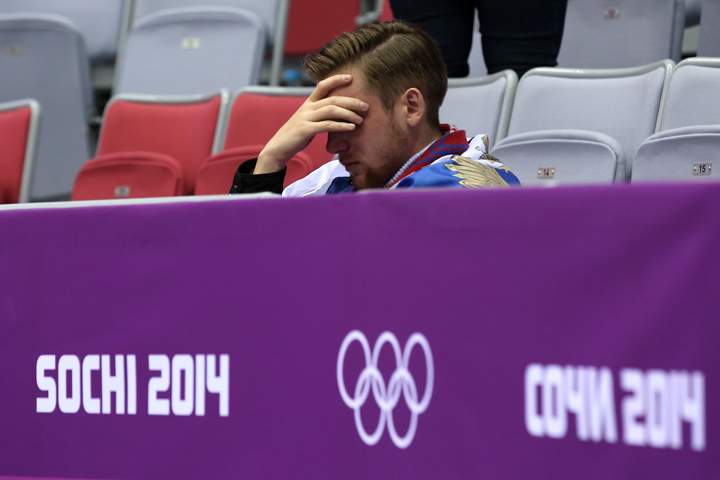 A fan reacts after Finland defeated Russia 3-1 during the Men’s Ice Hockey Quarterfinal Playoff on Day 12 of the 2014 Sochi Winter Olympics at Bolshoy Ice Dome on Feb. 19, 2014 in Sochi, Russia. (Photo credit: Bruce Bennett/Getty Images)