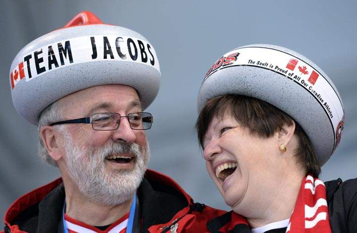 Canada’s supporters cheer during the Men’s Curling Round Robin Session 10 at the Ice Cube Curling Center during the Sochi Winter Olympics on February 16, 2014. (Andrej Isakovic/AFP/Getty Images)