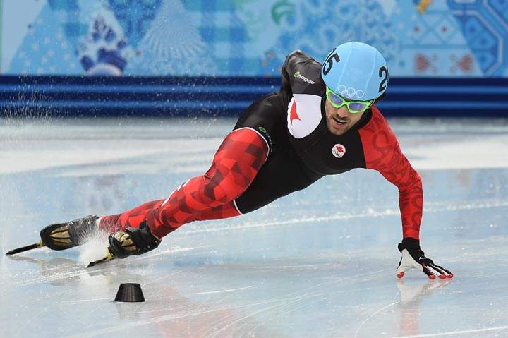 Canada’s Charles Hamelin competes in the Men’s Short Track 500 m Heat 8 at the Iceberg Skating Palace during the Sochi Winter Olympics on February 18, 2014. (Damien Meyer/AFP/Getty Images)
