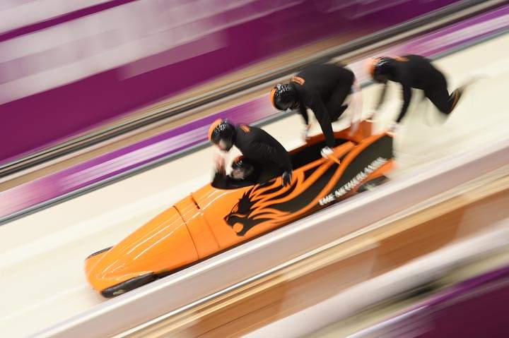 Netherlands-1 four-man bobsleigh, steered by Edwin van Calker takes part in the first four-man Bobsleigh official training during the Sochi Winter Olympics at the Sanki Sliding Center on February 19, 2014. (Leon Neal/AFP/Getty Images)