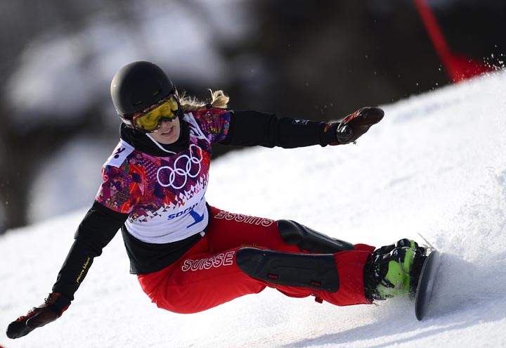 Switzerland’s Patrizia Kummer competes in the Women’s Snowboard Parallel Giant Slalom Semifinals at the Rosa Khutor Extreme Park during the Sochi Winter Olympics on February 19, 2014. (Javier Soriano/AFP/Getty Images)
