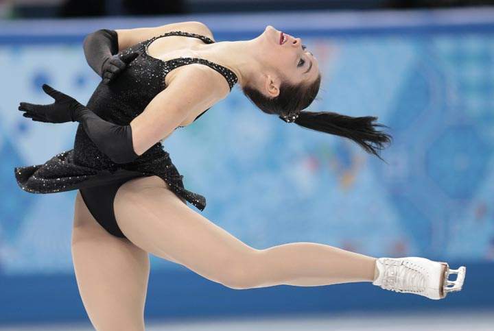 Kaetlyn Osmond of Canada competes in the women’s short program figure skating competition at the Iceberg Skating Palace during the 2014 Winter Olympics, Wednesday, Feb. 19, 2014, in Sochi, Russia. (AP Photo/Ivan Sekretarev)