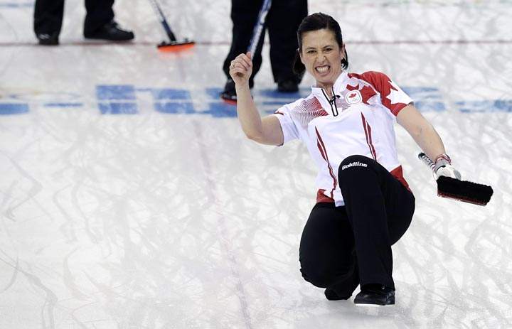 Canada’s Jill Officer reacts after delivering the rock during the women’s curling semifinal game against Britain at the 2014 Winter Olympics, Wednesday, Feb. 19, 2014, in Sochi, Russia. (AP Photo/Wong Maye-E)