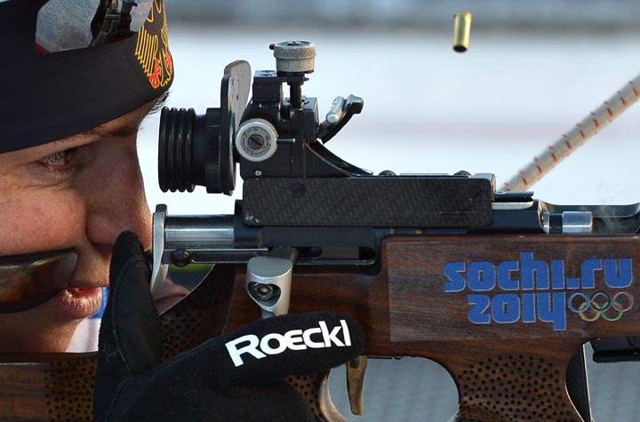 Germany’s biathlete Andrea Henkel shoots at the shooting range during a training session ahead of the Sochi 2014 Winter Olympics at the Laura Cross Country Skiing and Biathlon Centre in Rosa Khutor, near Sochi, on February 6, 2014. (Alberto Pizzoli/AFP/Getty Images)