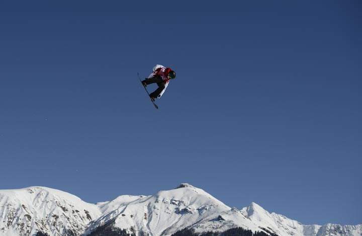 Canada’s Maxence Parrot competes in the Men’s Snowboard Slopestyle qualifications at the Rosa Khutor Extreme Park during the Sochi Winter Olympics on February 6, 2014. (Franck Fife/AFP/Getty Images)