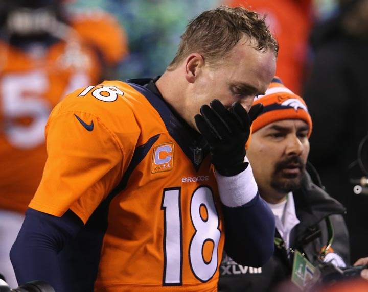 Quarterback Peyton Manning of the Denver Broncos walks off the field after their 43-8 loss to the Seattle Seahawks during Super Bowl XLVIII at MetLife Stadium on February 2, 2014 in East Rutherford, New Jersey. (Stephen Dunn/Getty Images)