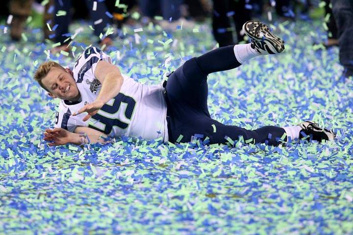 Long snapper Clint Gresham of the Seattle Seahawks celebrates their 43-8 victory over the Denver Broncos to win Super Bowl XLVIII at MetLife Stadium on February 2, 2014 in East Rutherford, New Jersey. (Photo by Stephen Dunn/Getty Images)