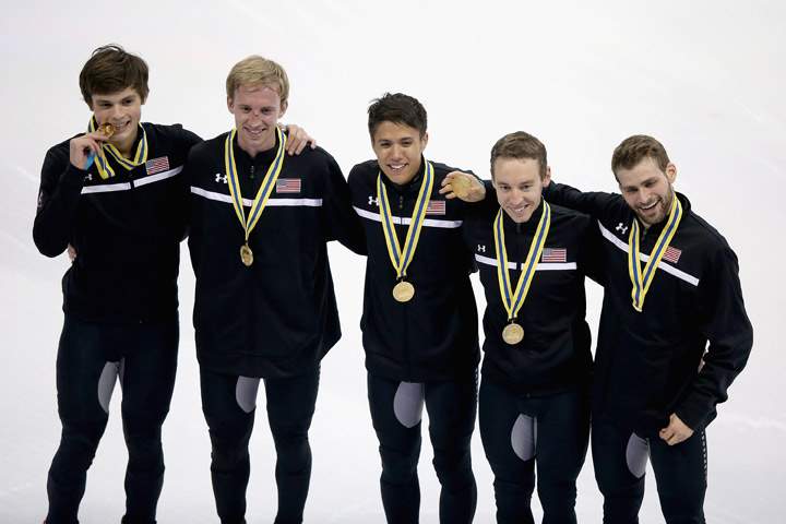 Gold medalists Jordan Malone, Chris Creveling, Jeff Simon, J.R. Celski of United States team pose during the medal presentation for the Men’s 5000m Final.
