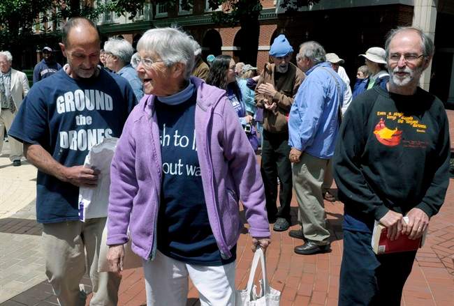 In this Monday, May 6, 2013, file photo, anti-nuclear weapons activists, from left, Michael Walli, Sister Megan Rice and Greg Boertje-Obed arrive for their trial in Knoxville, Tenn.
