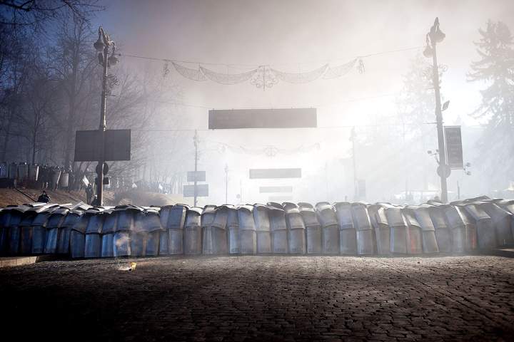 Anti-government protesters clash with riot police in Kyiv, Ukraine on Feb. 18. 2014. / (Photo credit: Emeric Fohlen/AP Photo)