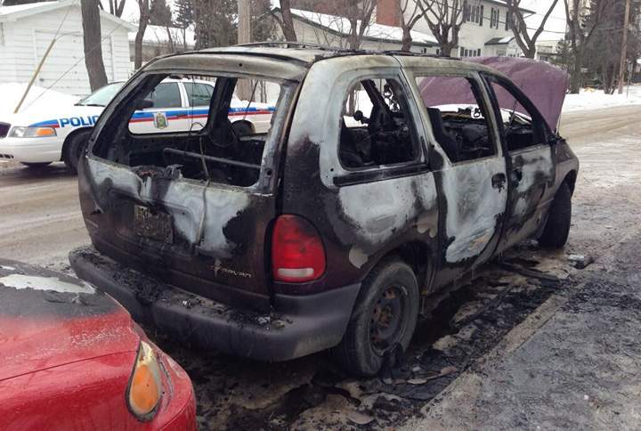 Saskatoon police are on the lookout for four suspects after an armed robbery and vehicle fire on Saturday.