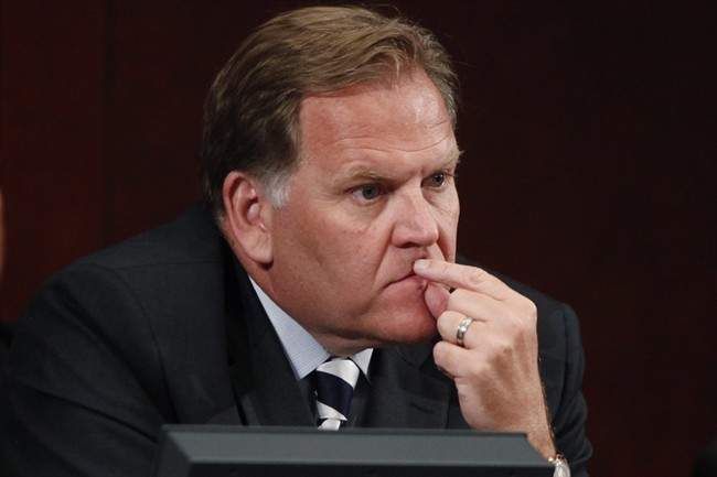 FILE - In this June 18, 2013, file photo, House Intelligence Committee Chairman Rep. Mike Rogers, R-Mich. listens to testimony on Capitol Hill in Washington, Tuesday, June 18, 2013, by National Security Agency Gen. Keith B. Alexander.