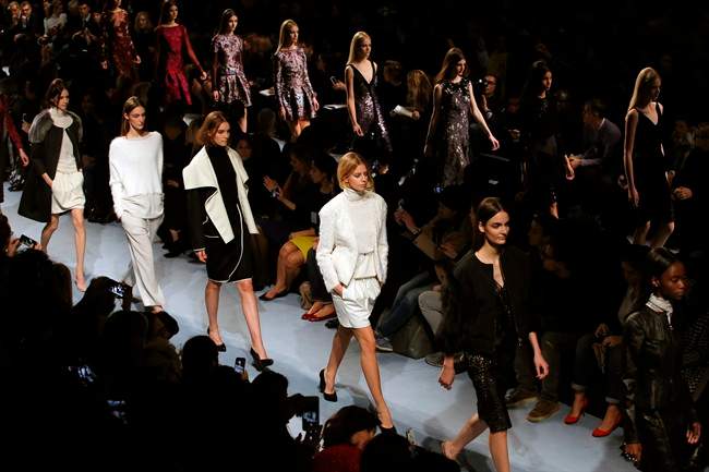 Models wear creations for Nina Ricci\’s ready-to-wear fall/winter 2014-2015 fashion collection presented in Paris, Thursday, Feb. 27, 2014.