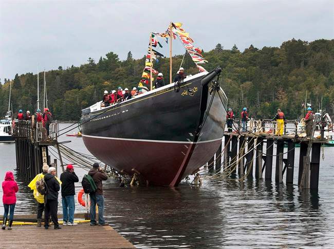 The Bluenose II is lowered in Lunenburg, N.S., after a refit, on September 29, 2012.