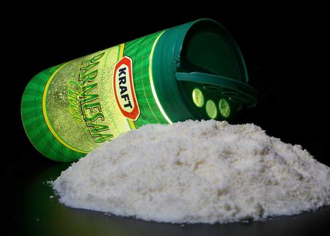 A package of Kraft parmesan cheese is seen in Washington, Tuesday, March 11, 2014.