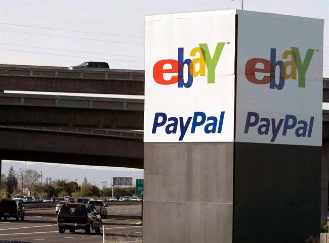 In this Jan. 19, 2011 photo, an eBay/PayPal sign is shown in San Jose, Calif. 