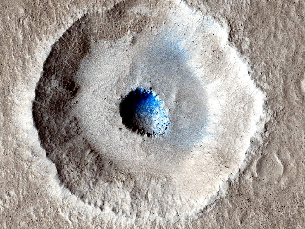 Bullseye. Though most impact craters are bowl-shaped, this crater is more unusual, as it has a wide, flat bench between its outer rim and inner section.