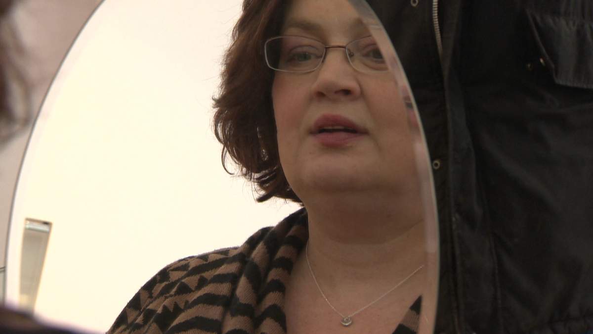 Manitoba Finance Minister Jennifer Howard shops for a new necklace on Tuesday.
