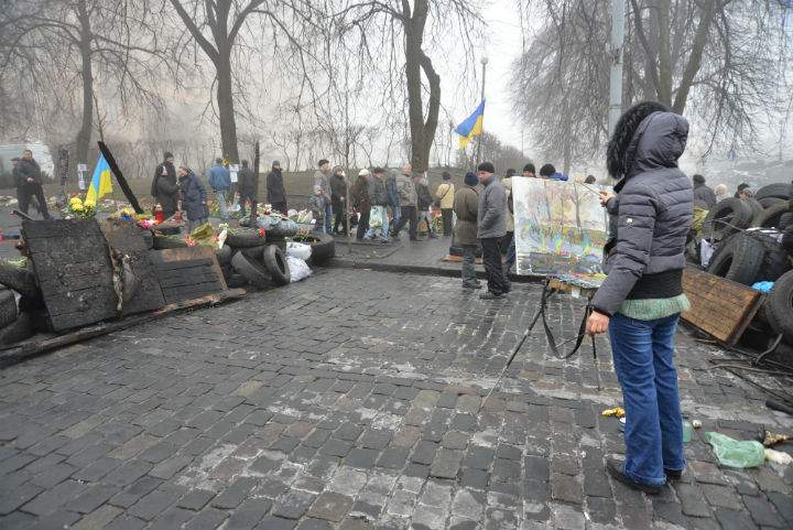 An artist has been painting the events of the past months in Kyiv's Independence Square.