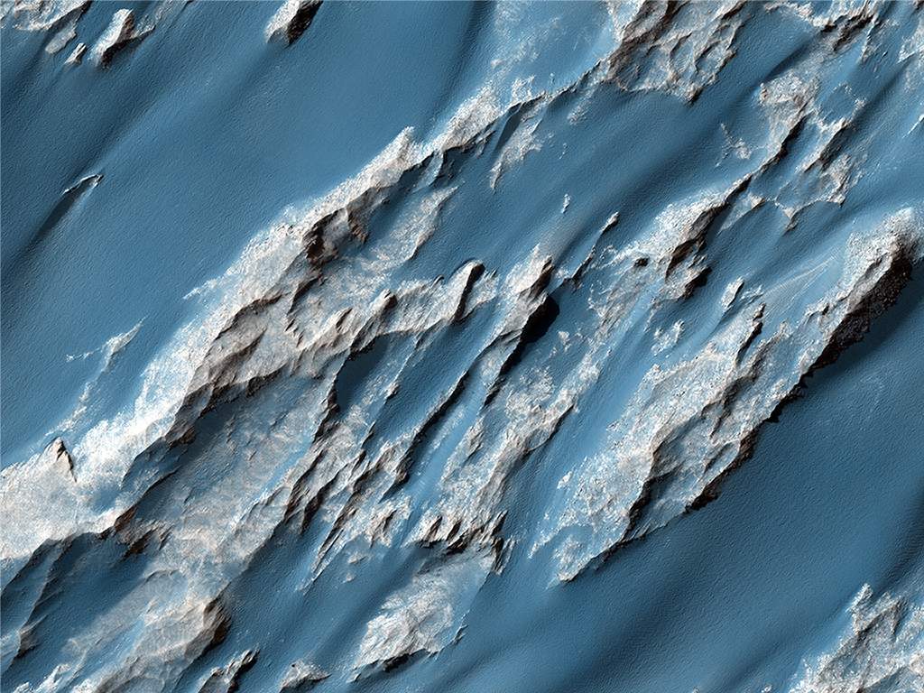 Ancient landslides. This image shows an approximately 3-billion year-old landslide in Ophir Chasma.