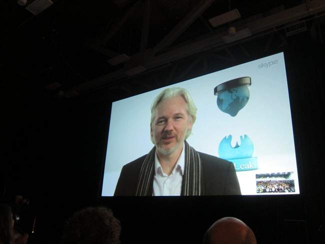 WikLeaks founder Julian Assange speaks via Skype at the South By SouthWest Interactive festival in Austin, Texas, Saturday, March 8, 2014. 