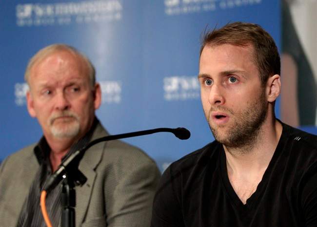 Dallas Stars forward Rich Peverley, right, makes a statement regarding his health and the incident which occurred in a recent NHL game during a news conference at UT Southwestern Medical Center as coach Lindy Ruff looks on Wednesday, March 12, 2014, in Dallas. Peverley will not play again this season. 