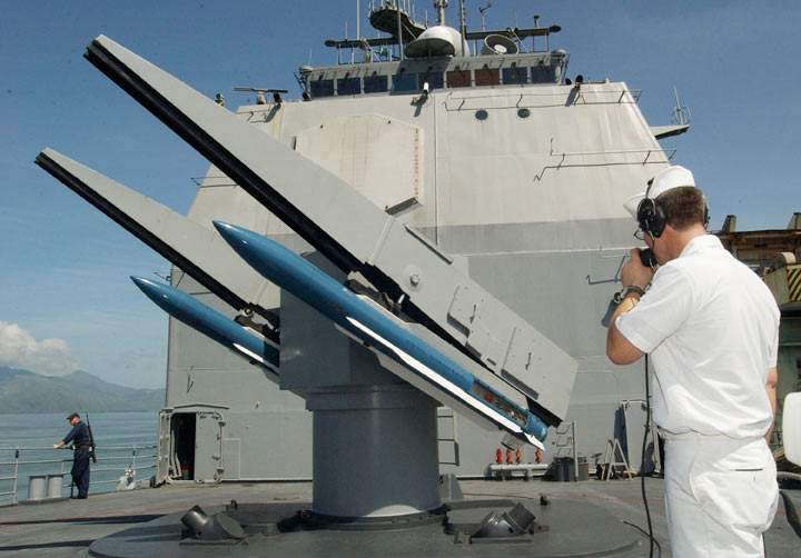 A crew member of USS Vincennes performs a daily maintenance check of a Mark 26 Guided missile July, 17, 2002 in Zambales, Philippines.