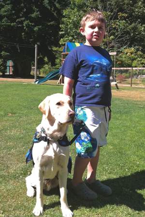 Caleb Weidenbacher’s autism support dog Richie provides safety and comfort in public places and at home.