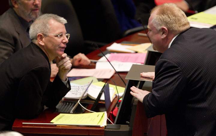 Mayor Rob Ford confronts councillor Adam Vaughan during a regular council meeting at City Hall in Toronto on November 18, 2013.
