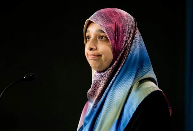 Sarah Attia, wife of Khaled Al-Qazzaz, attends a news conference Tuesday April 29, 2014 in Ottawa. 