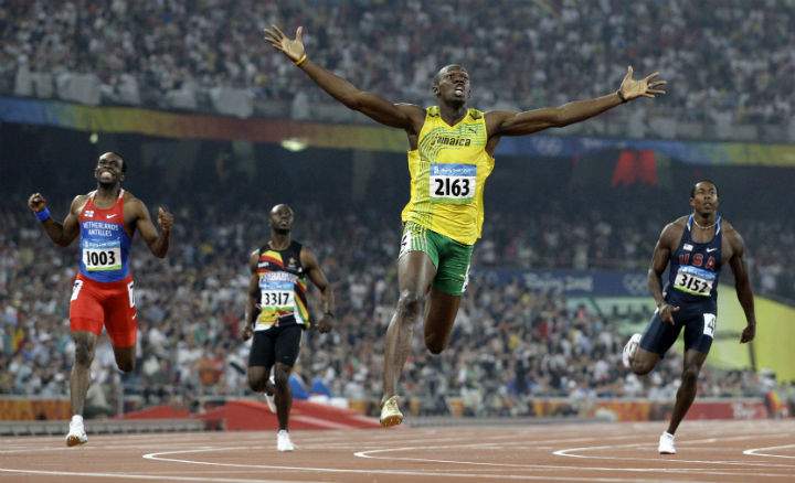 Jamaica’s Usain Bolt crosses the finish line to win the gold in the men’s 200-meter final at the Beijing 2008 Olympics in Beijing on Aug. 20, 2008.